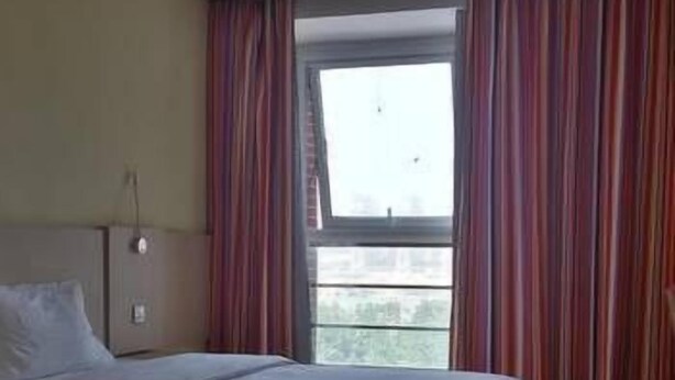 Unclassified image, 1 of 8, button - 7 Days Inn (Qingdao)