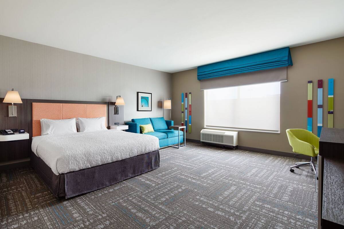 Hypo-allergenic bedding, in-room safe, desk, laptop workspace