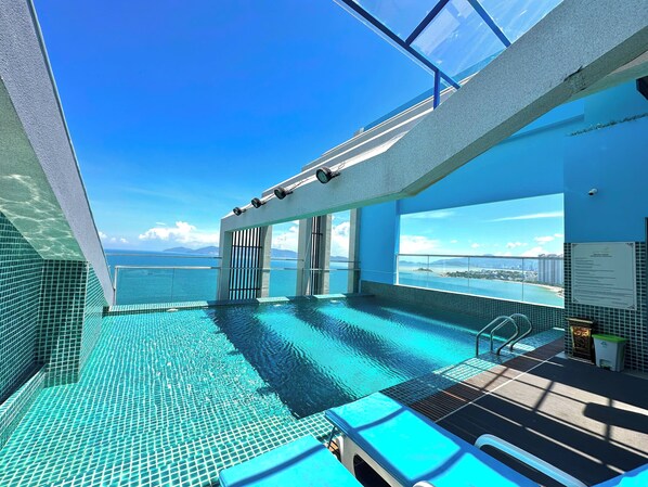 Outdoor pool, sun loungers