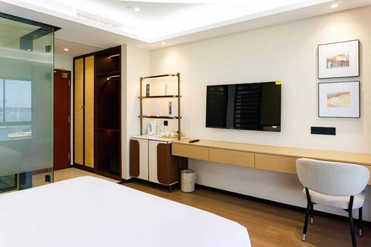 Premium bedding, desk, blackout curtains, soundproofing