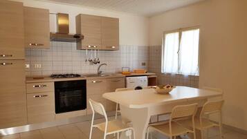 Villa, 3 Bedrooms | Private kitchen | Full-sized fridge, stovetop, cookware/dishes/utensils