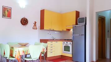 Villa, 2 Bedrooms | Private kitchenette | Full-sized fridge, stovetop, cookware/dishes/utensils