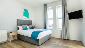 Desk, blackout curtains, soundproofing, free WiFi