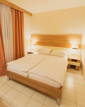 Apartament, 1 dormitori (2 Adl+1 Ch) | 1 dormitori, minibar, caixa forta a l'habitació i escriptori 