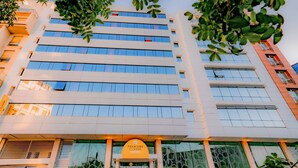 A modern building with multiple floors and large windows. - Hotel Première Classe Casablanca Centre Ville (Casablanca)