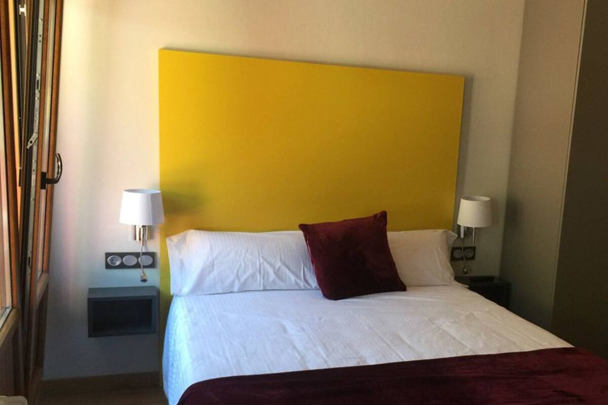 Habitación cuádruple | Cunas gratuitas, wifi gratis y ropa de cama