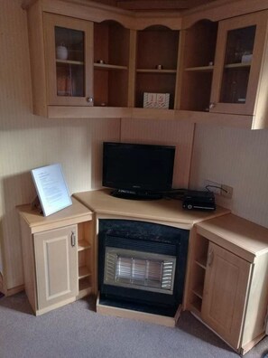 Holiday Home, 3 Bedrooms | Living area | Flat-screen TV, fireplace - Holiday Home Arizona in Coghurst Holiday Park (Hastings)