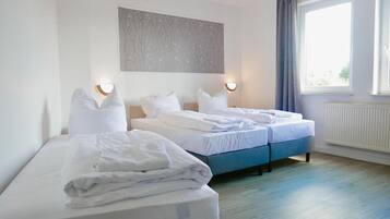 Premium bedding, desk, blackout drapes, iron/ironing board