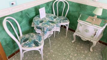 Exclusive Double Room | Living area | Flat-screen TV