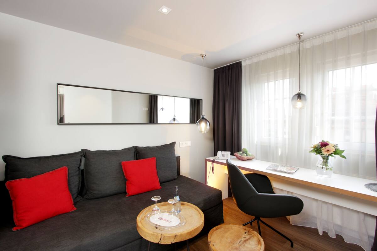 Family Suite, 2 Bedrooms, Non Smoking | Living area | Flat-screen TV, pay movies
