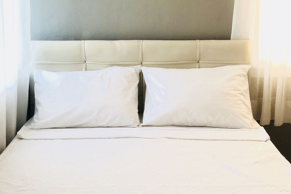 Blackout curtains, soundproofing, free WiFi, bed sheets