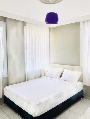 Verduisterende gordijnen, geluiddichte muren, gratis wifi, beddengoed