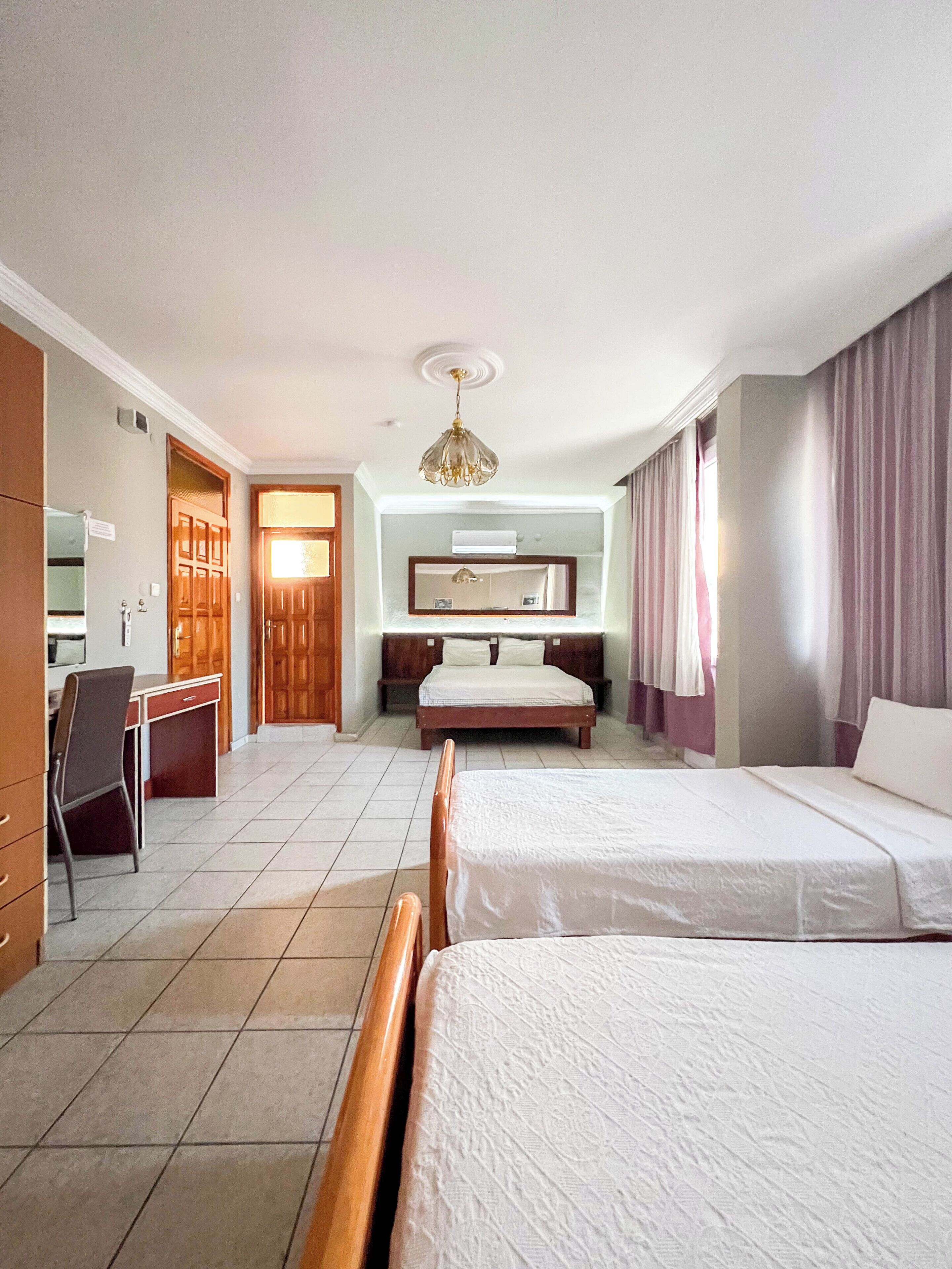Standard Quadruple Room | Blackout curtains, soundproofing, free WiFi, bed sheets