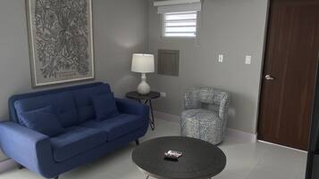 Family Suite | Living area | Flat-screen TV