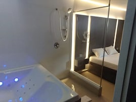 Habitación Premier doble | Bañera de hidromasaje privada
