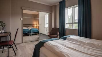 Deluxe Double or Twin Room, Private Bathroom | Blackout drapes, soundproofing, free cribs/infant beds, free WiFi