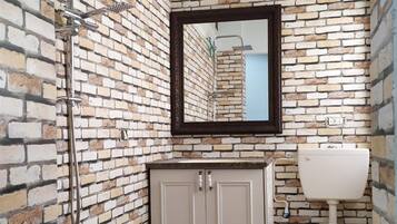 Douche, serviettes fournies