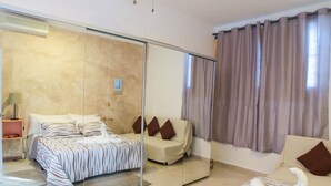Quadruple Room, Multiple Beds, Non Smoking | Blackout curtains, cots/infant beds, free WiFi, individually decorated - Villa Rosa Dominicus (San Rafael del Yuma)