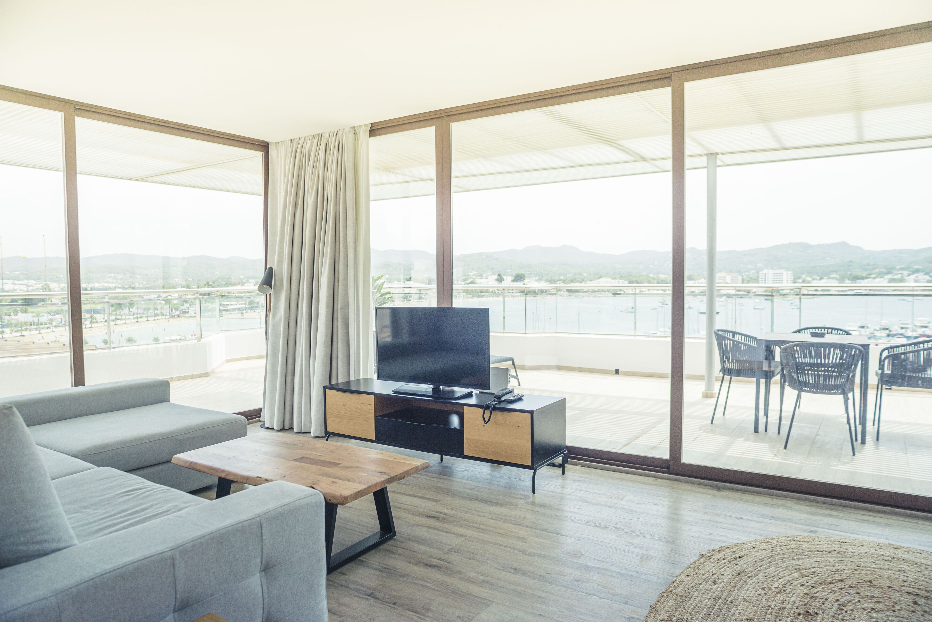 premium penthouse, 2 bedrooms, terrace, sea view | living area | 24-inch smart tv with satellite channels, tv