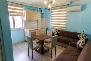 Elite Apartment, Kitchen | Living area