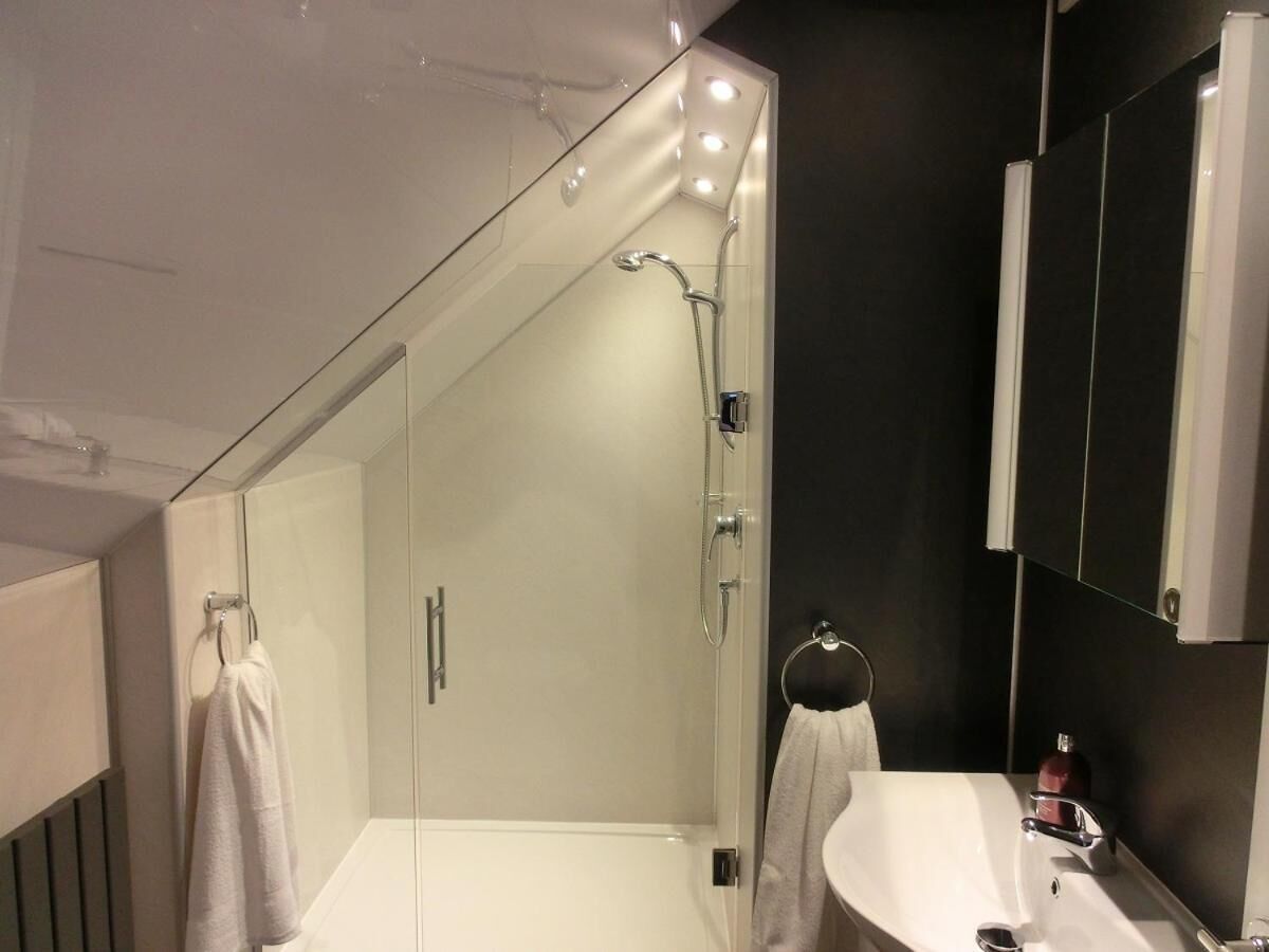 shower, free toiletries, hair dryer, dressing gowns