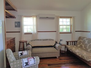 Cottage, 1 Queen Bed, Non Smoking | Living area | Flat-screen TV