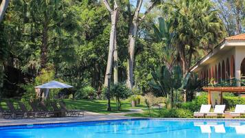 Outdoor pool, pool umbrellas, pool loungers