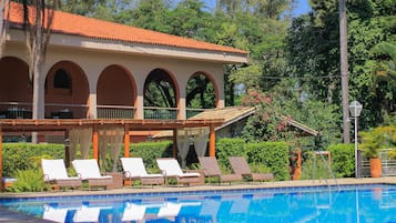 Outdoor pool, pool umbrellas, sun loungers