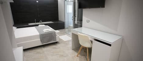 Suite, Jetted Tub | In-room safe, desk, free WiFi, bed sheets