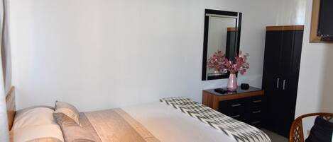 2 bedrooms, desk, iron/ironing board, travel cot