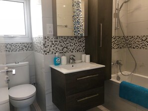 Hair dryer, towels, toilet paper