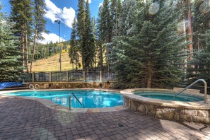 Outdoor pool, a heated pool - Ski-in/Ski-out Condo w/ Private Balcony for Stunning Tree & Mountain Views! (Keystone)