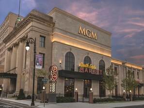 A large building with a prominent 'MGM' sign and 'South End Market' sign.