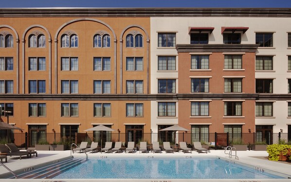 Seasonal outdoor pool, open 8:00 AM to 8:00 PM, pool umbrellas