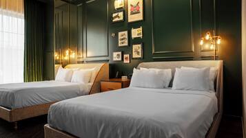 Premium bedding, pillowtop beds, in-room safe, blackout drapes