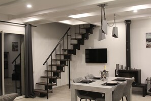 Design Apartment, 1 Bedroom, Fireplace, Sea View | Living area | Flat-screen TV, DVD player, heated floors - Residence BEAU RIVAGE Brehec (Plouha)