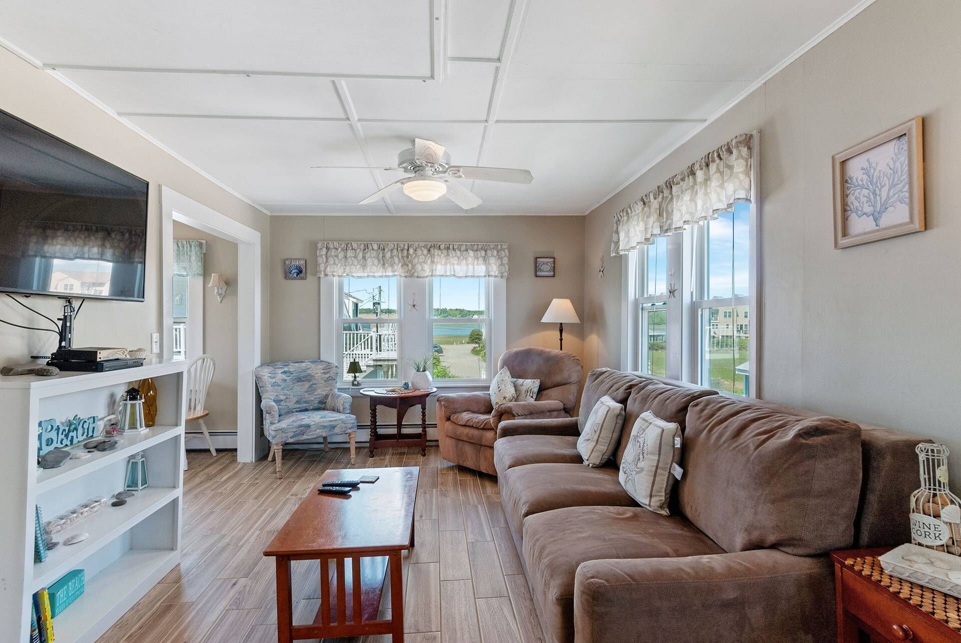 Flat-screen TV, DVD player, books