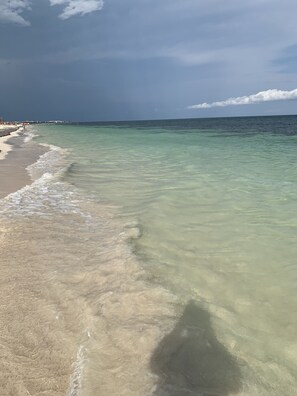 On the beach, sun-loungers, beach towels