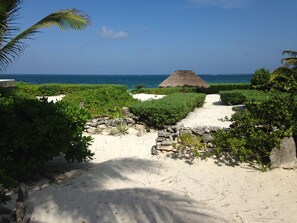 On the beach, sun-loungers, beach towels
