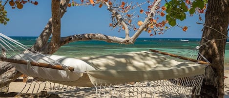 Private beach, free beach shuttle, free beach cabanas, sun loungers