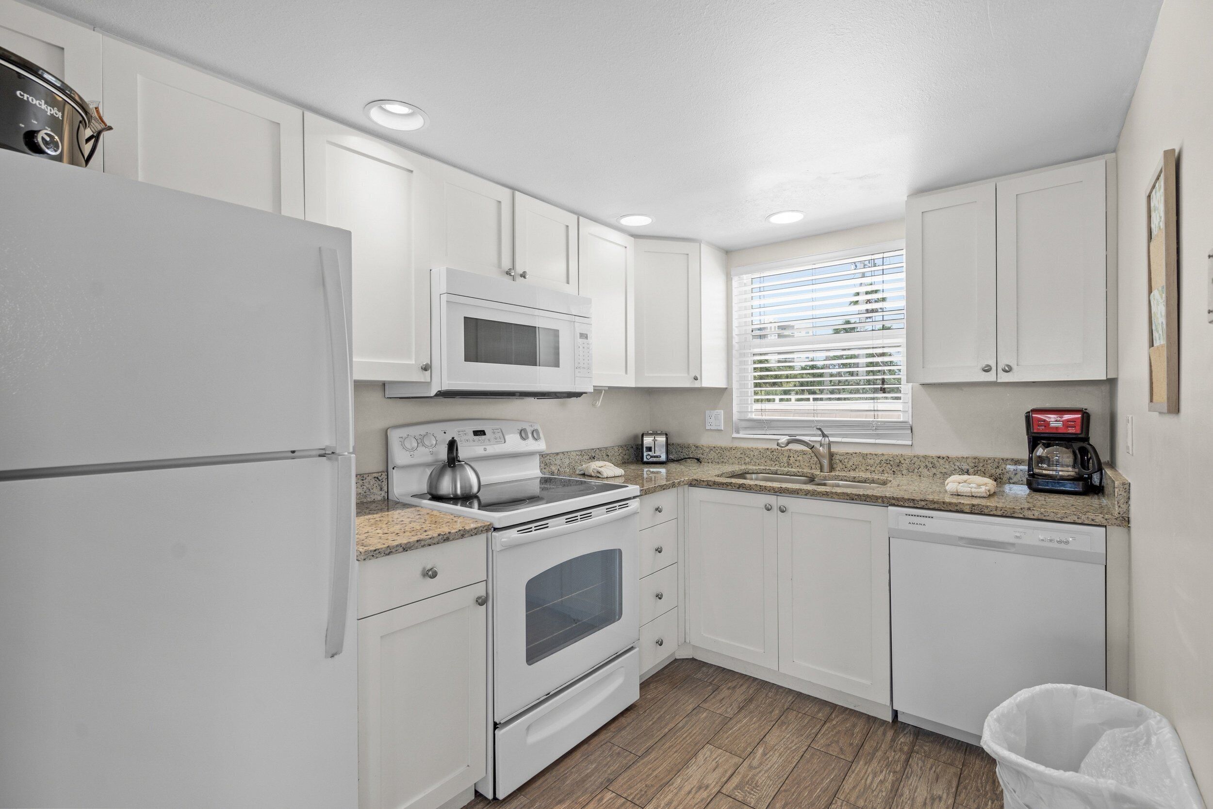 Fridge, microwave, coffee/tea maker, toaster