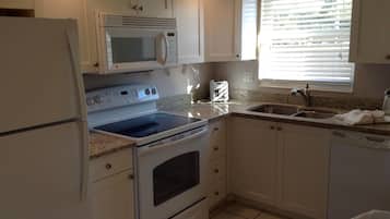 Fridge, microwave, coffee/tea maker, toaster