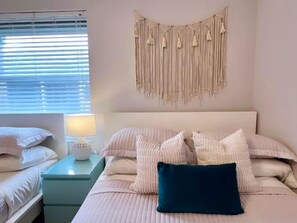 2 bedrooms, travel crib, WiFi, bed sheets