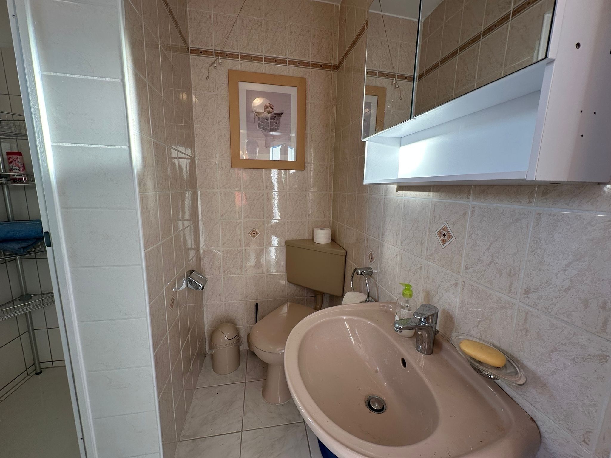 Shower, hair dryer, towels, toilet paper
