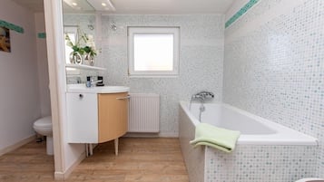 Baignoire, sèche-cheveux