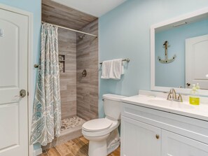 Combined shower/bathtub, hair dryer, towels, soap