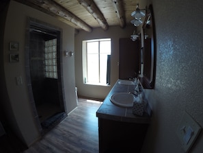 Combined shower/bathtub, hair dryer, towels, soap