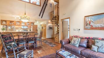 Älytelevisio, takka, DVD-soitin, kirjoja