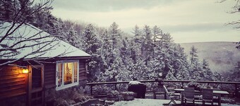Beautiful, remote Catskills cabin over waterfall with amazing views & hot tub