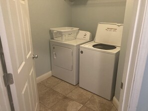 Convenient laundry facilities include a washer and dryer.